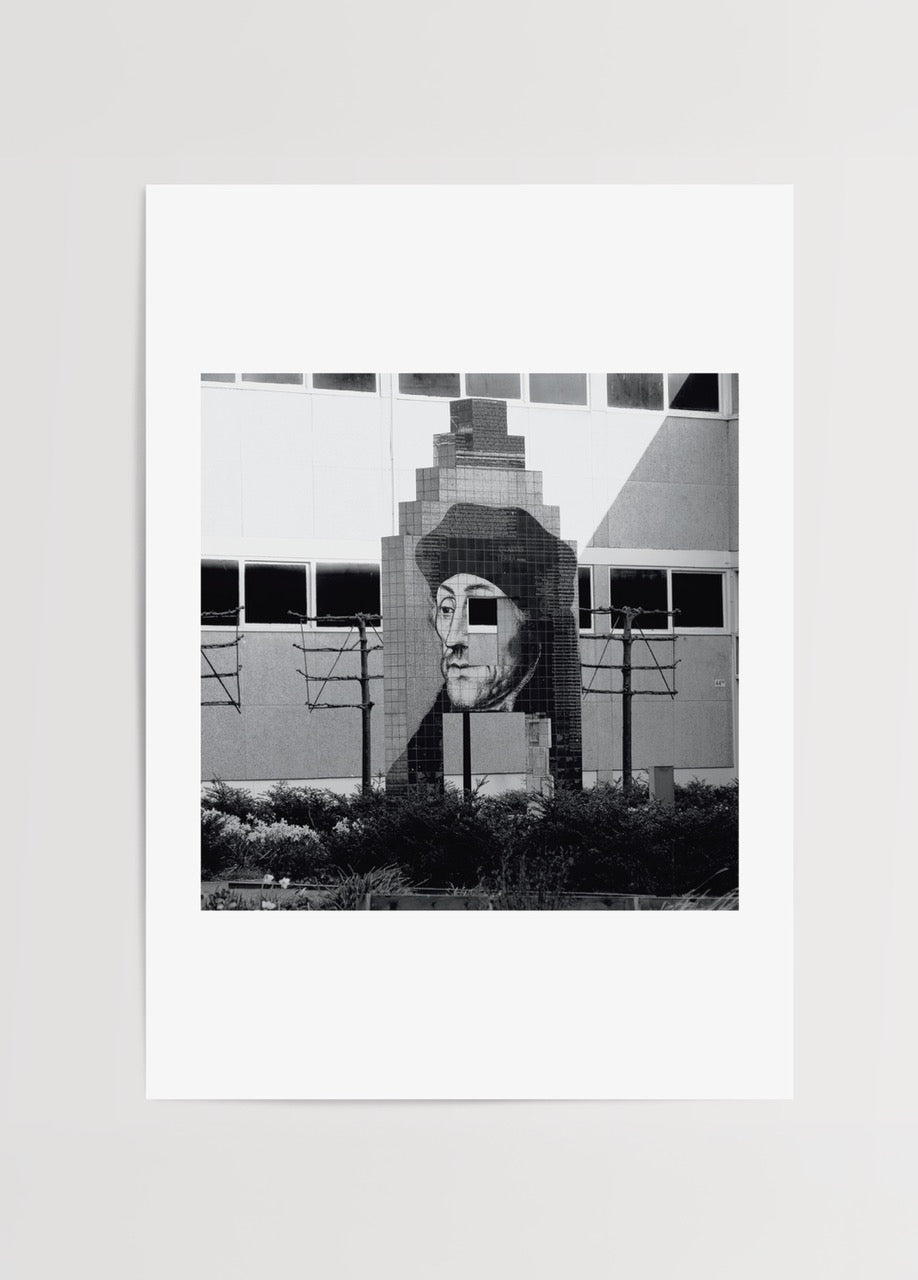 Black and white artwork of a historical figure in Amsterdam.