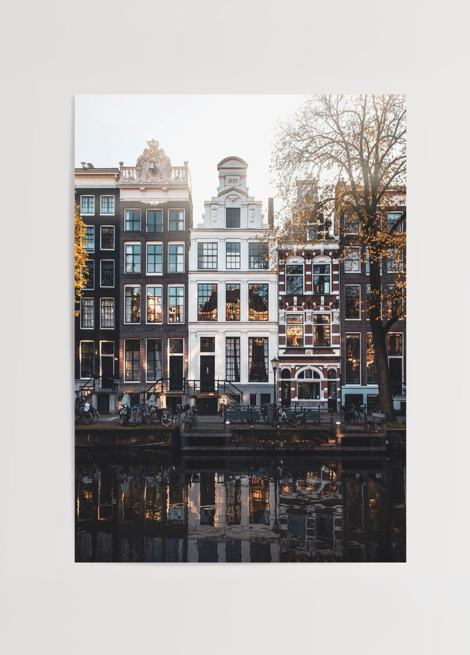 Charming Canals of Amsterdam wall art print showcasing historic buildings along the waterfront.
