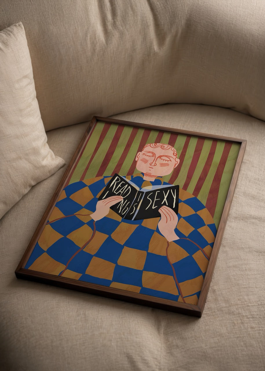 A vibrant poster print featuring a person reading with a playful message about reading.