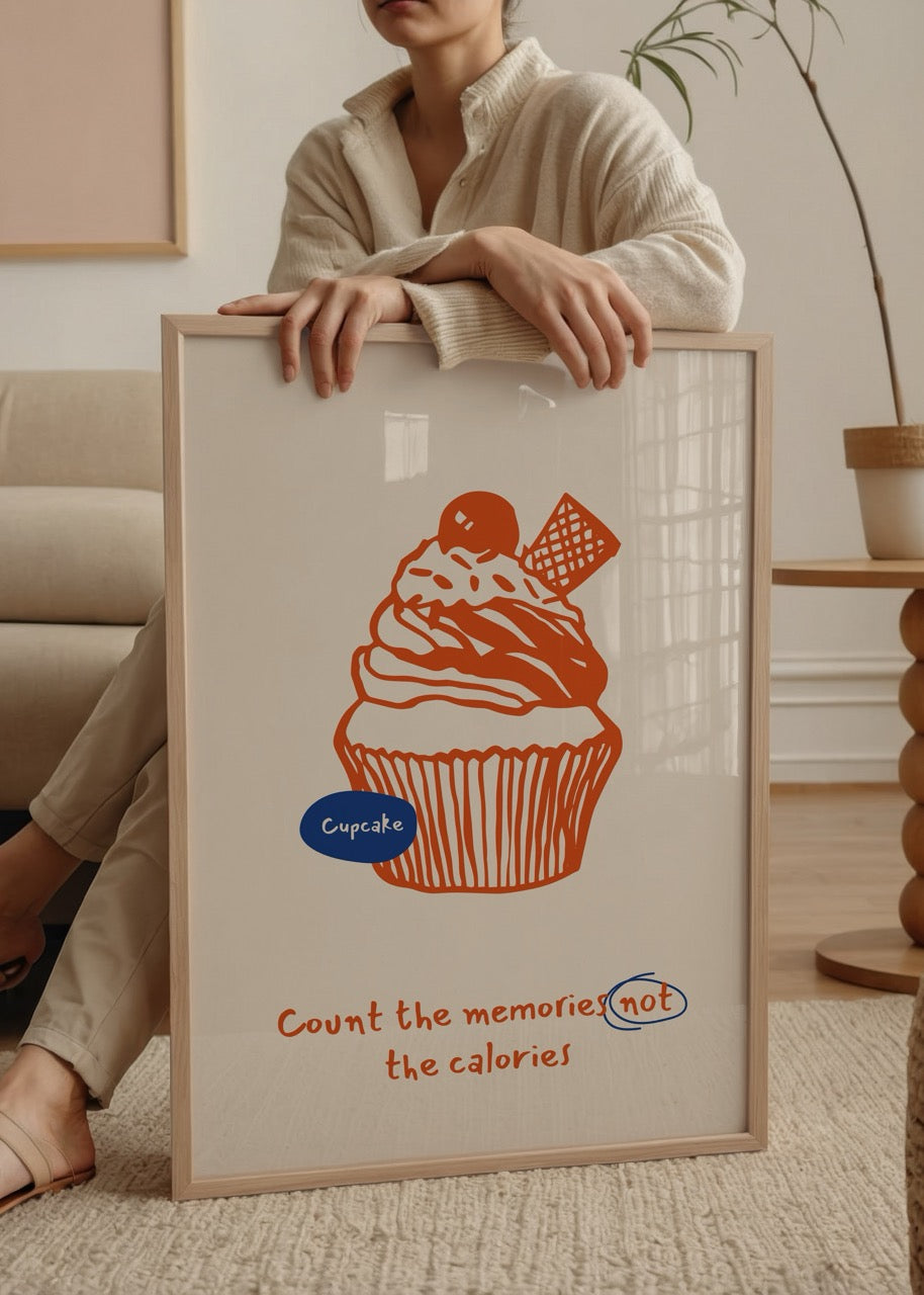 Illustrative cupcake artwork with orange and blue accents promoting joy over calories.