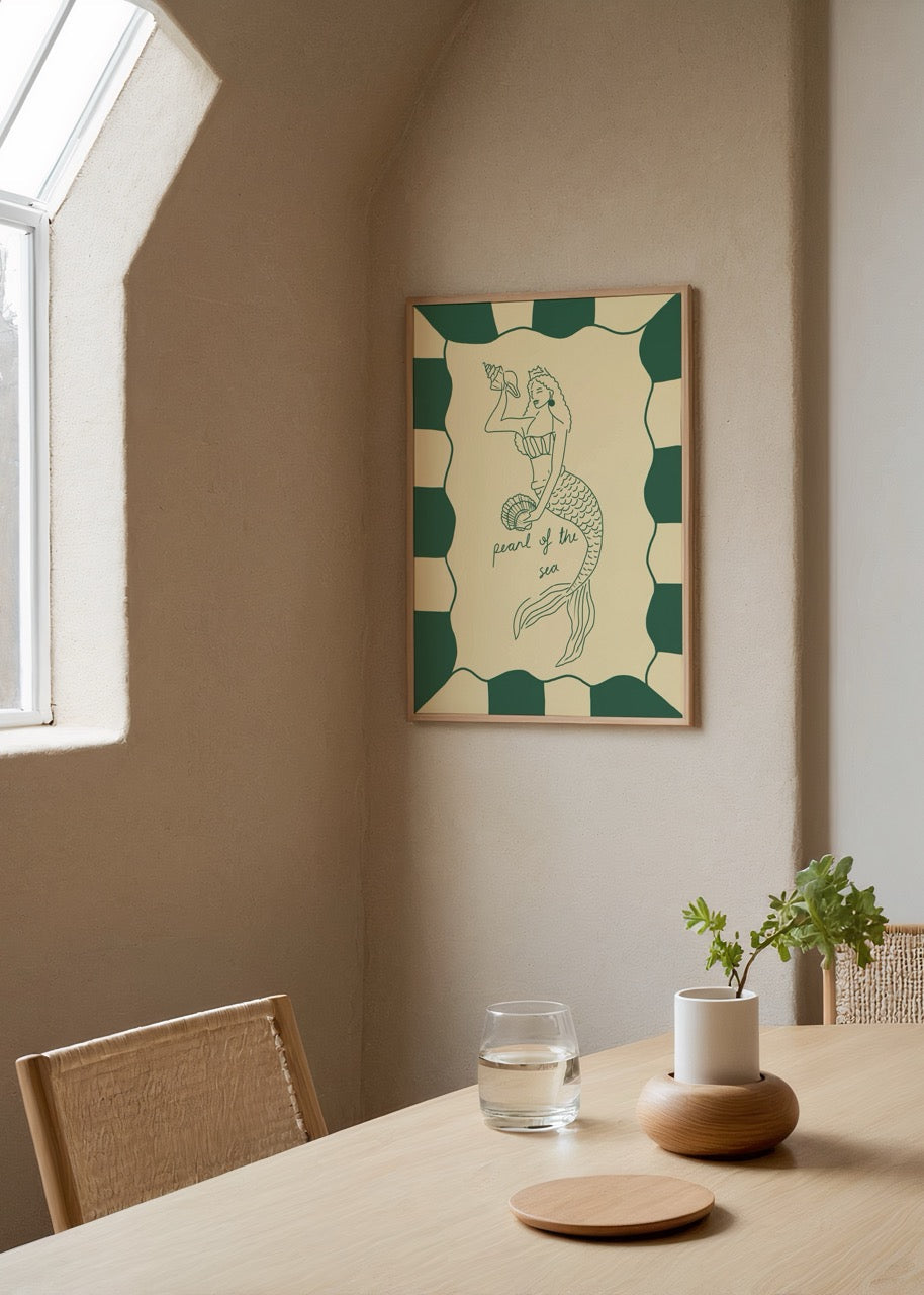 Illustrative wall art of a mermaid holding a shell, in green and beige tones.