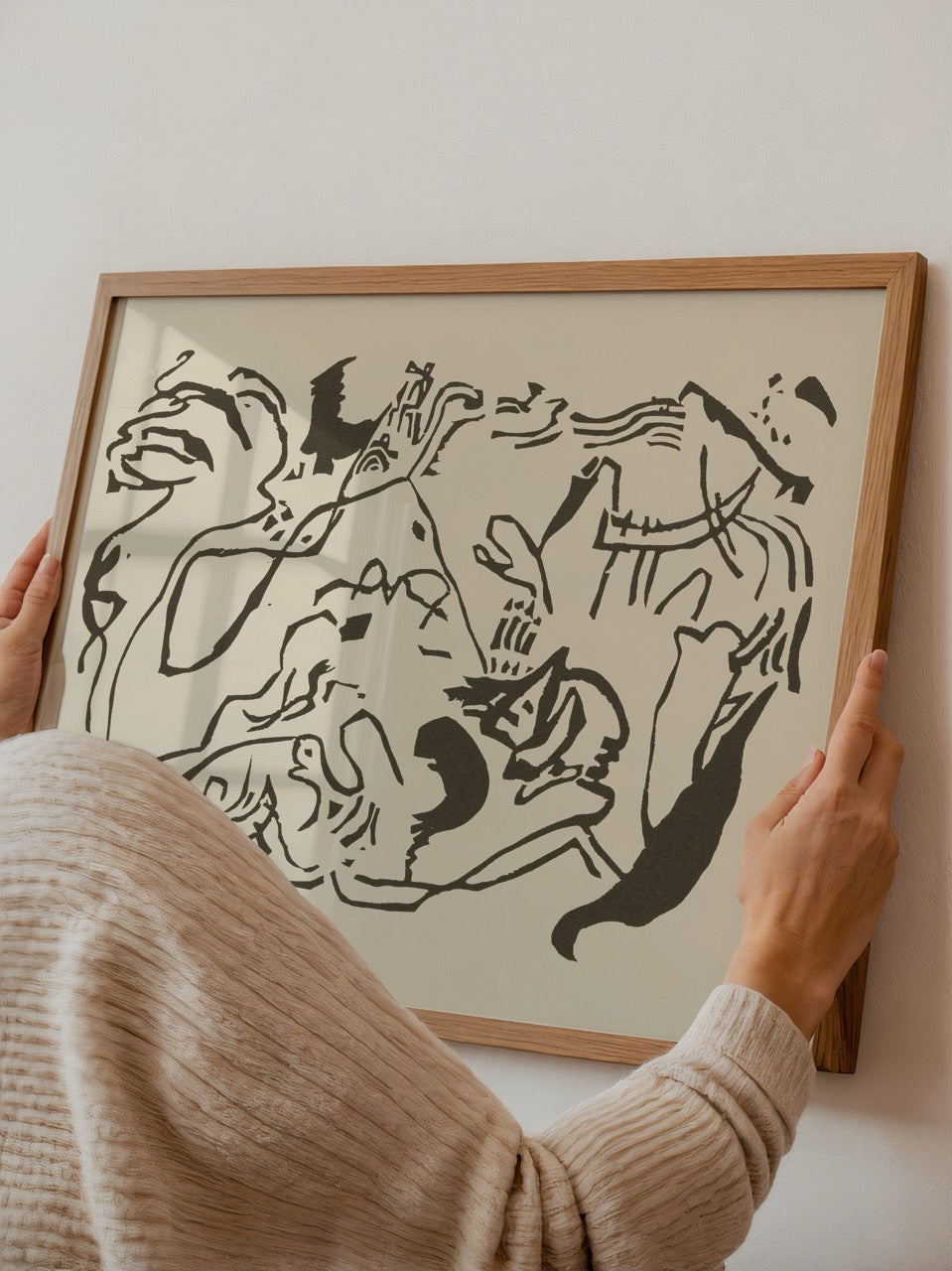 Abstract poster featuring fluid lines and organic shapes on beige background.