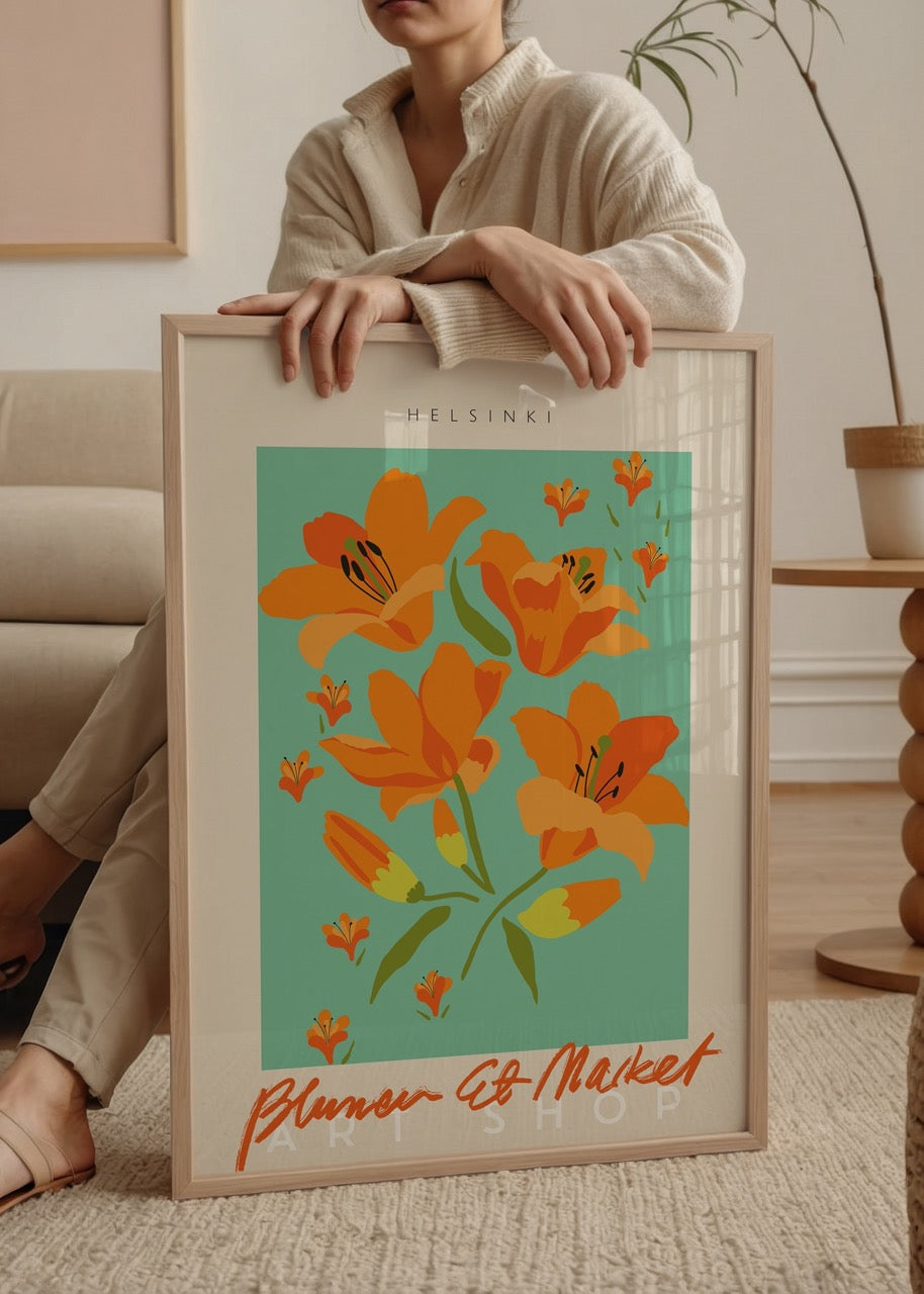 Vibrant floral print featuring orange lilies on turquoise background.