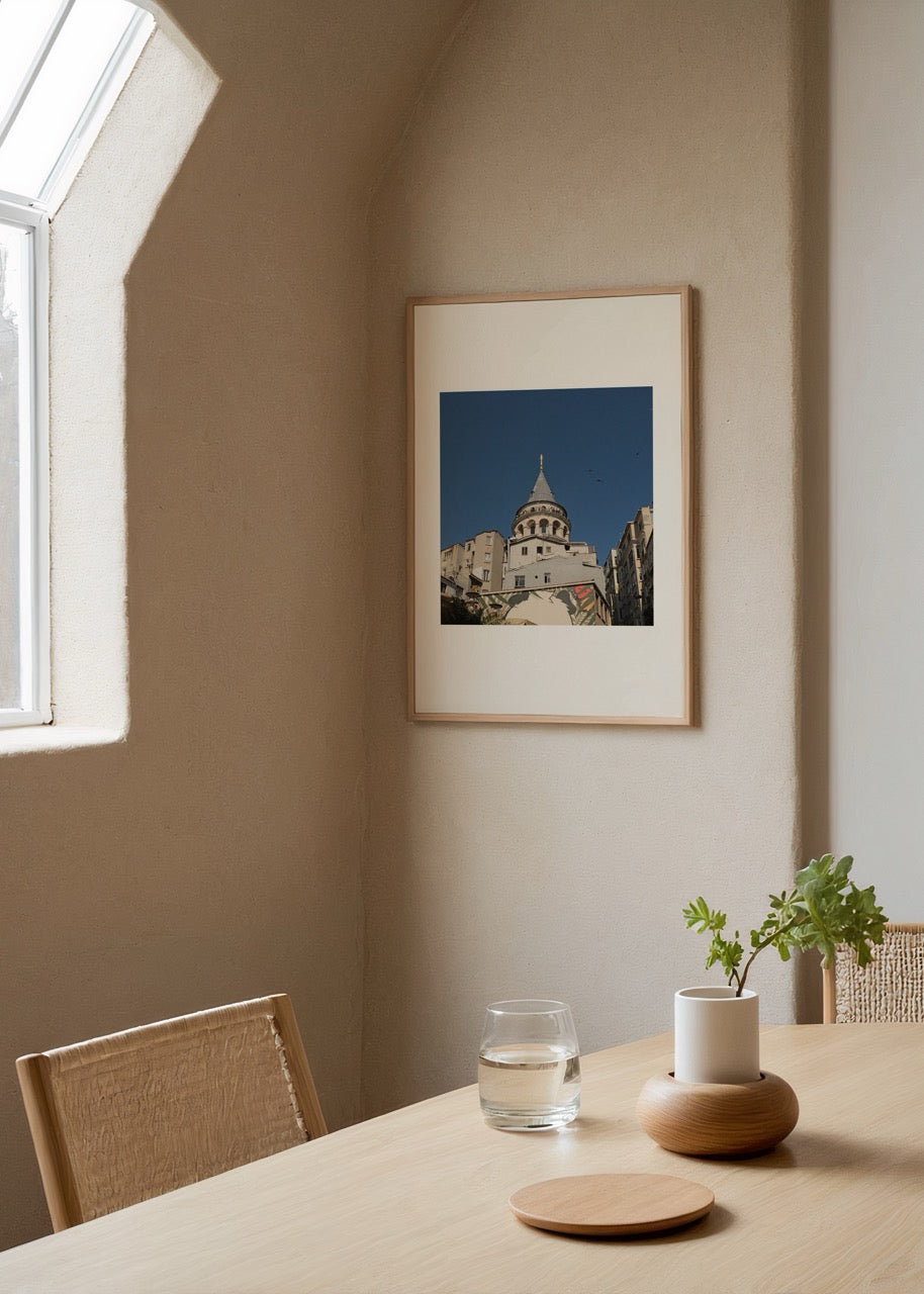 Photograph of Galata Tower in Istanbul against a blue sky.