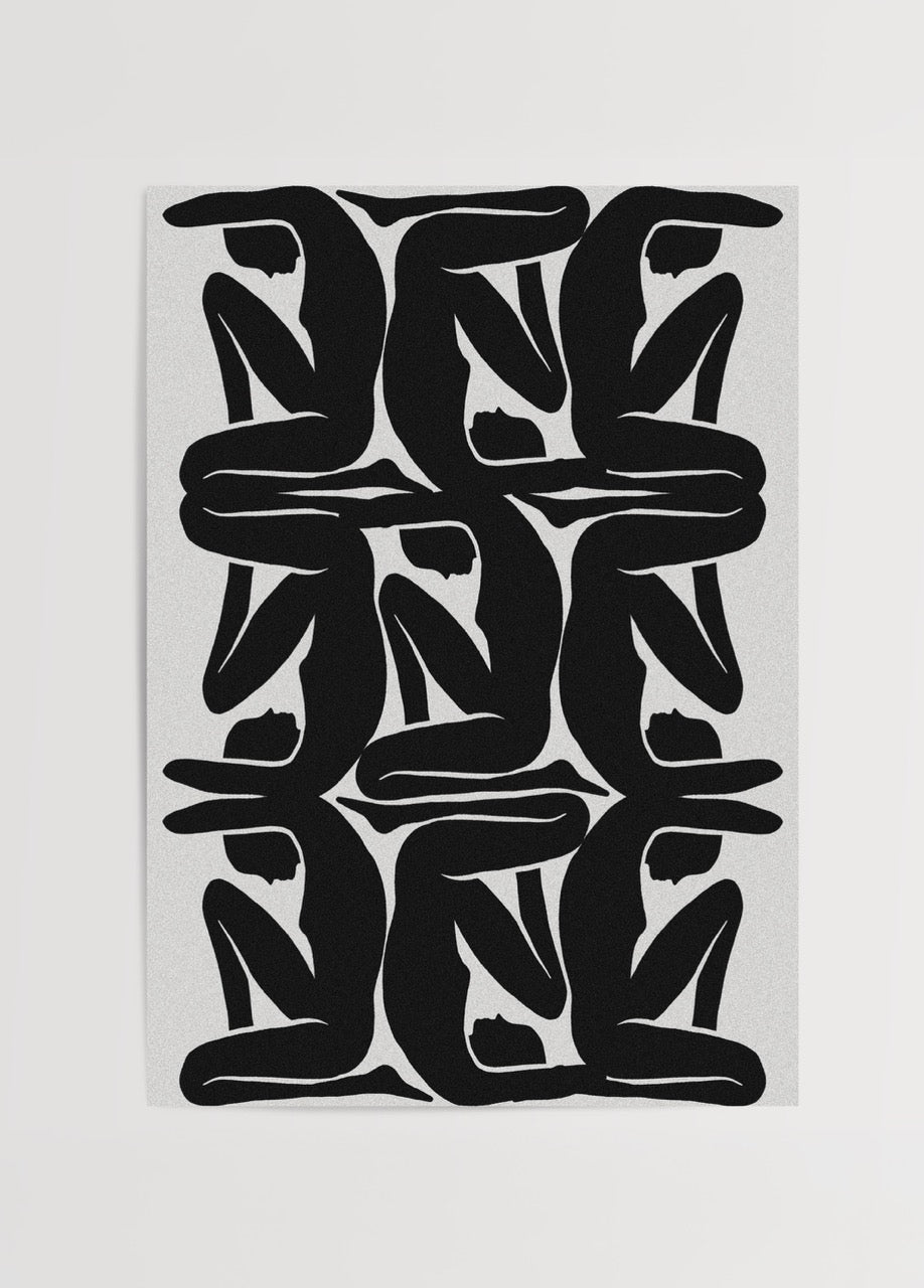 Geometric wall art featuring abstract black silhouettes in a modern design.