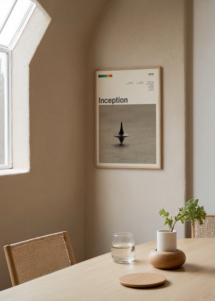 Minimalist wall art featuring a spinning top, symbolising dreams and reality.