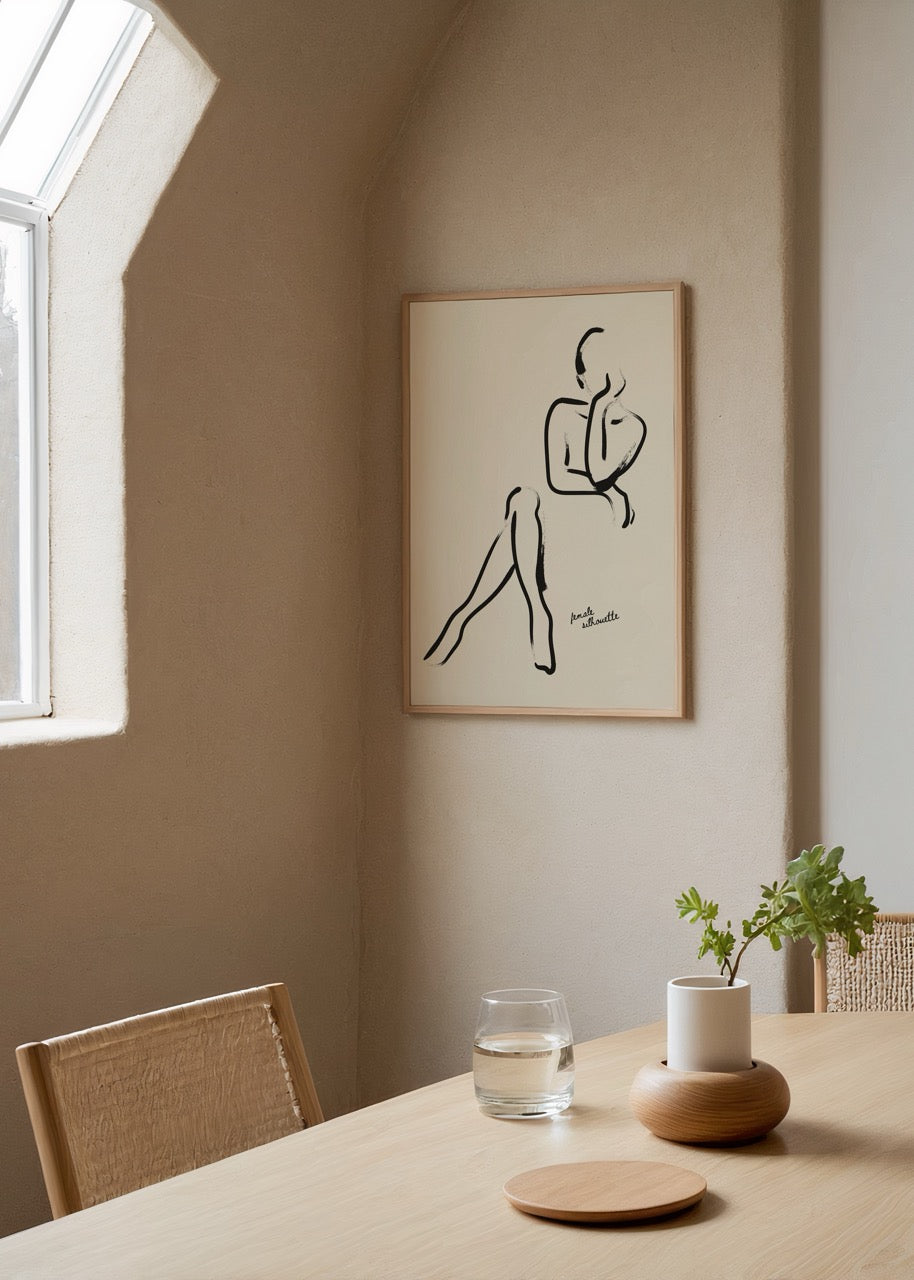 Elegant Female Silhouette Art Print featuring minimalist black lines on a light background.