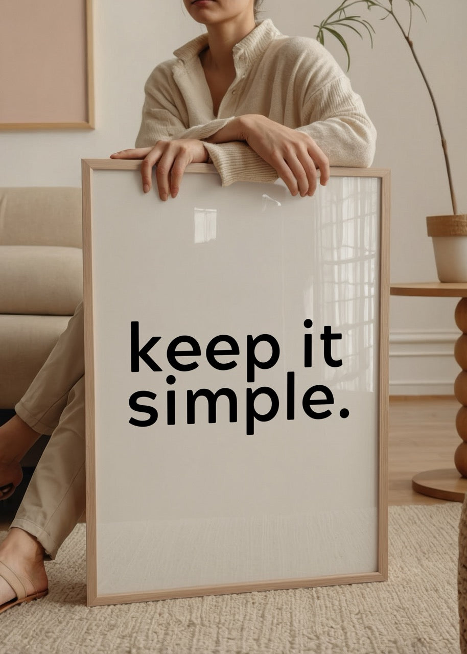 Simplicity in Monochrome poster featuring bold typography on a white background.