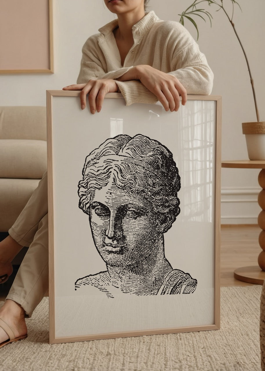 Classic black and white engraving of a bust sculpture showcasing intricate details.