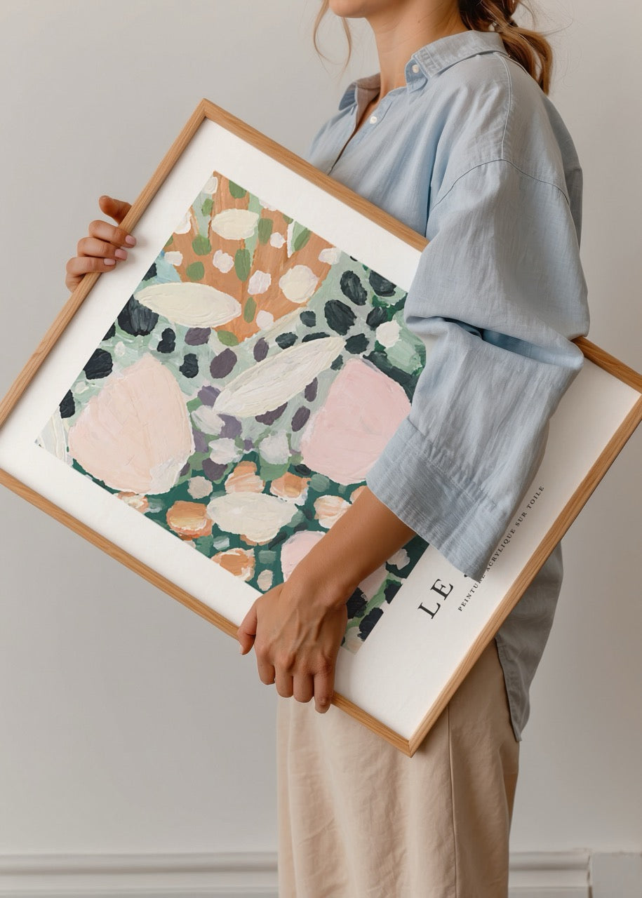 Abstract floral artwork featuring soft pinks and greens.