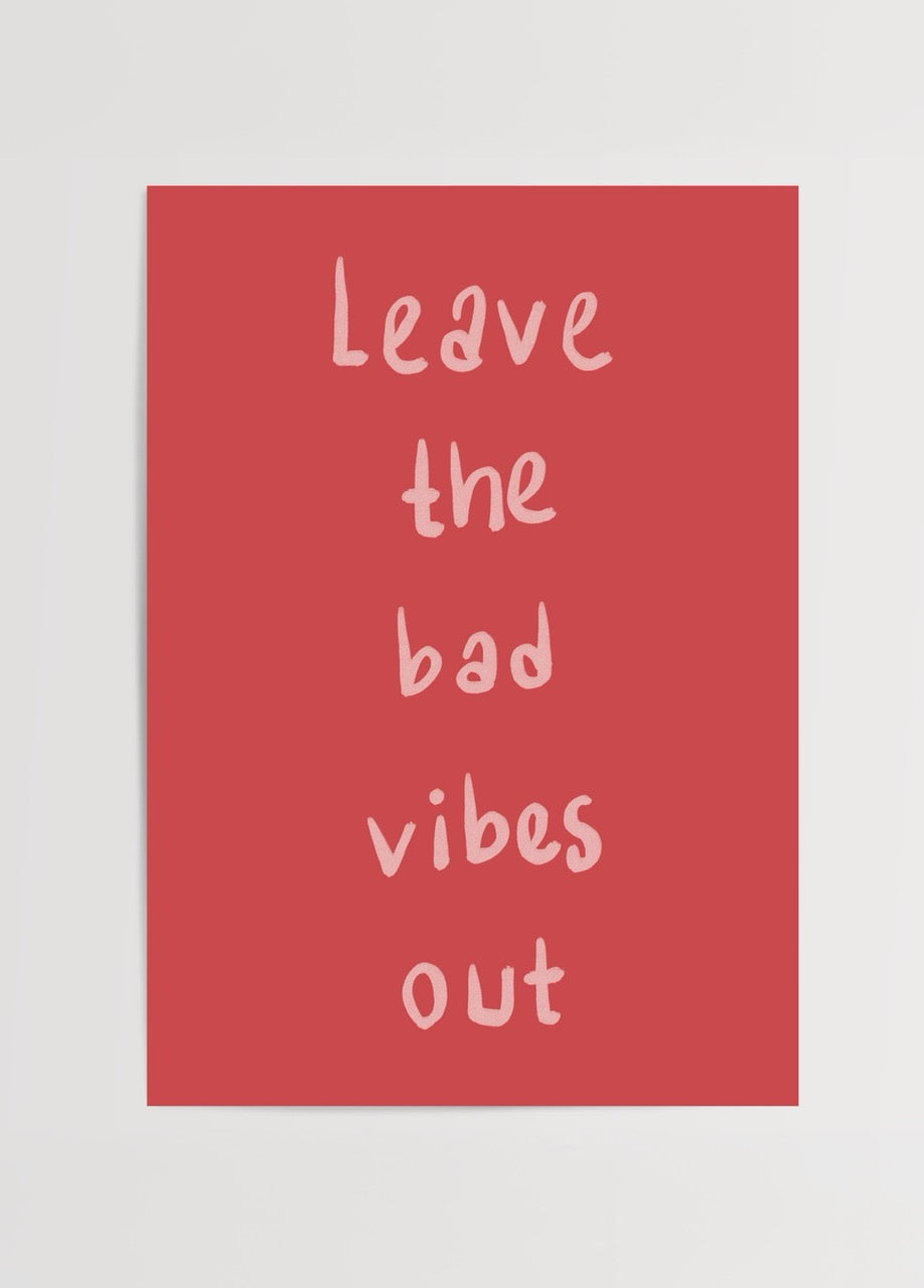Leave the Bad Vibes Out poster in vibrant red with playful typography.