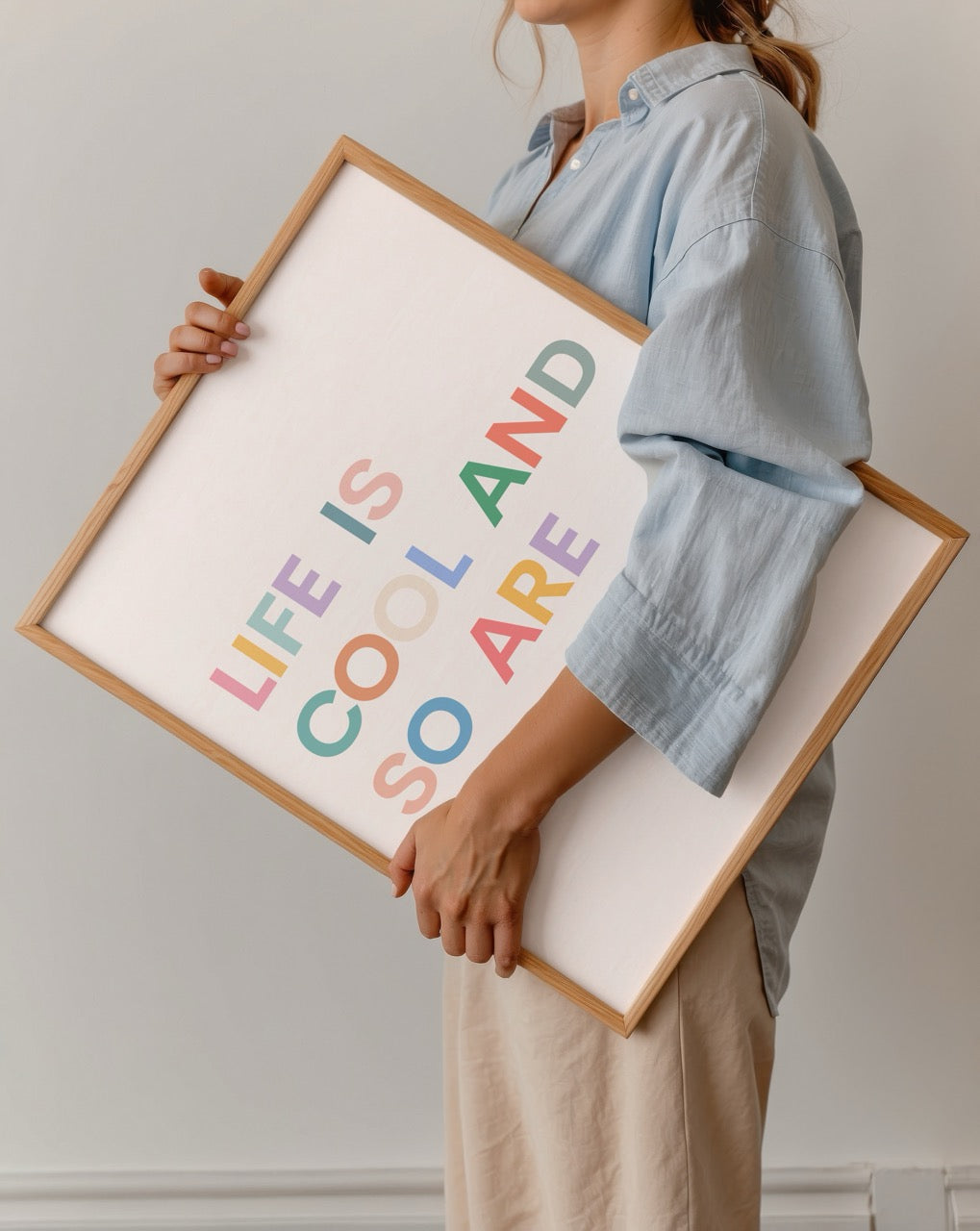 Bright typography poster featuring the phrase Life Is Cool and So Are You on a pastel background.