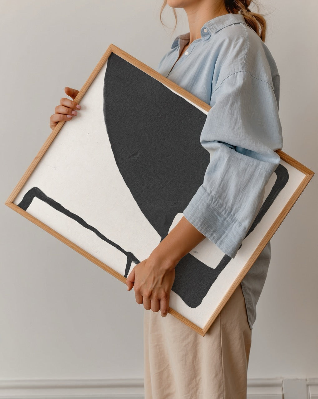 Monochrome geometric print featuring bold black shapes on white background.