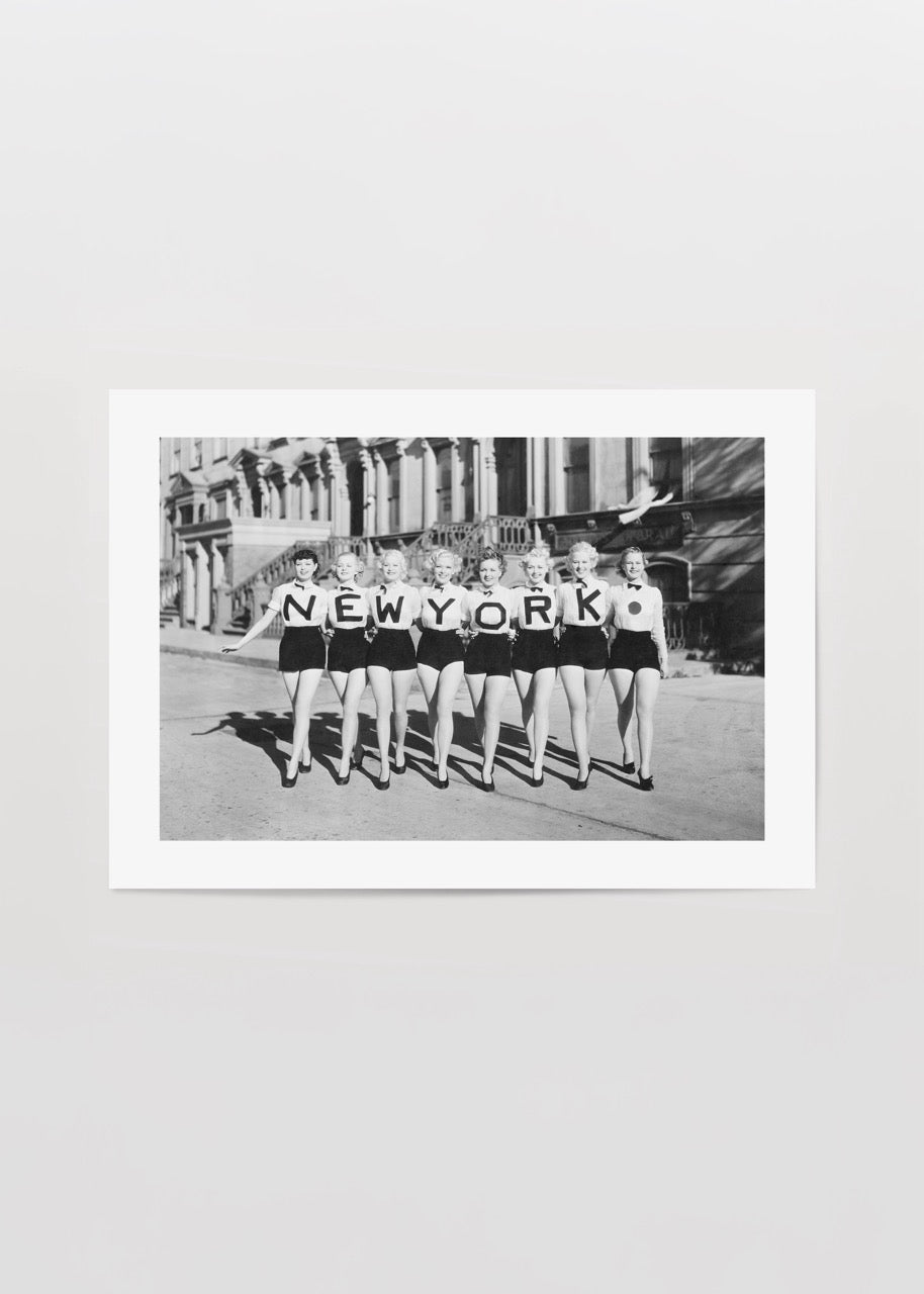 Vintage black and white print of a swimwear parade in New York