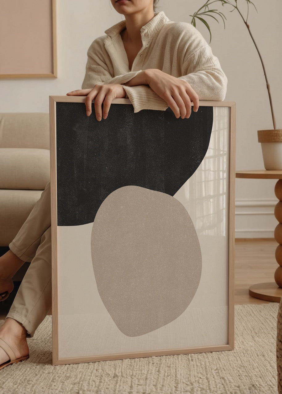 Stylish minimalist poster featuring organic shapes in neutral tones.