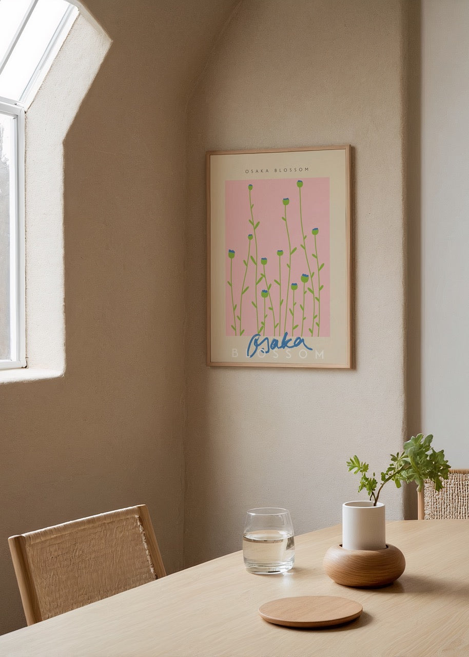 Elegant floral illustration with delicate stems and blooms in pink tones.