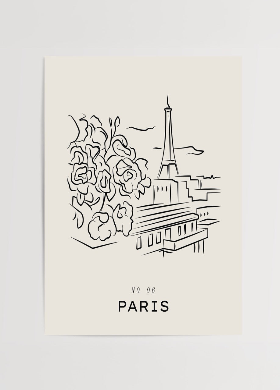 Elegant black and white wall art featuring the Eiffel Tower and floral elements.