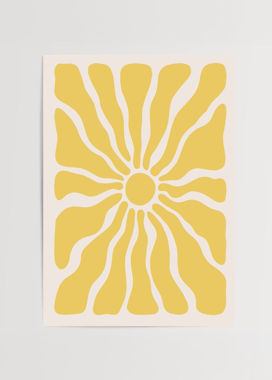 Abstract print featuring a vibrant yellow sunburst design.