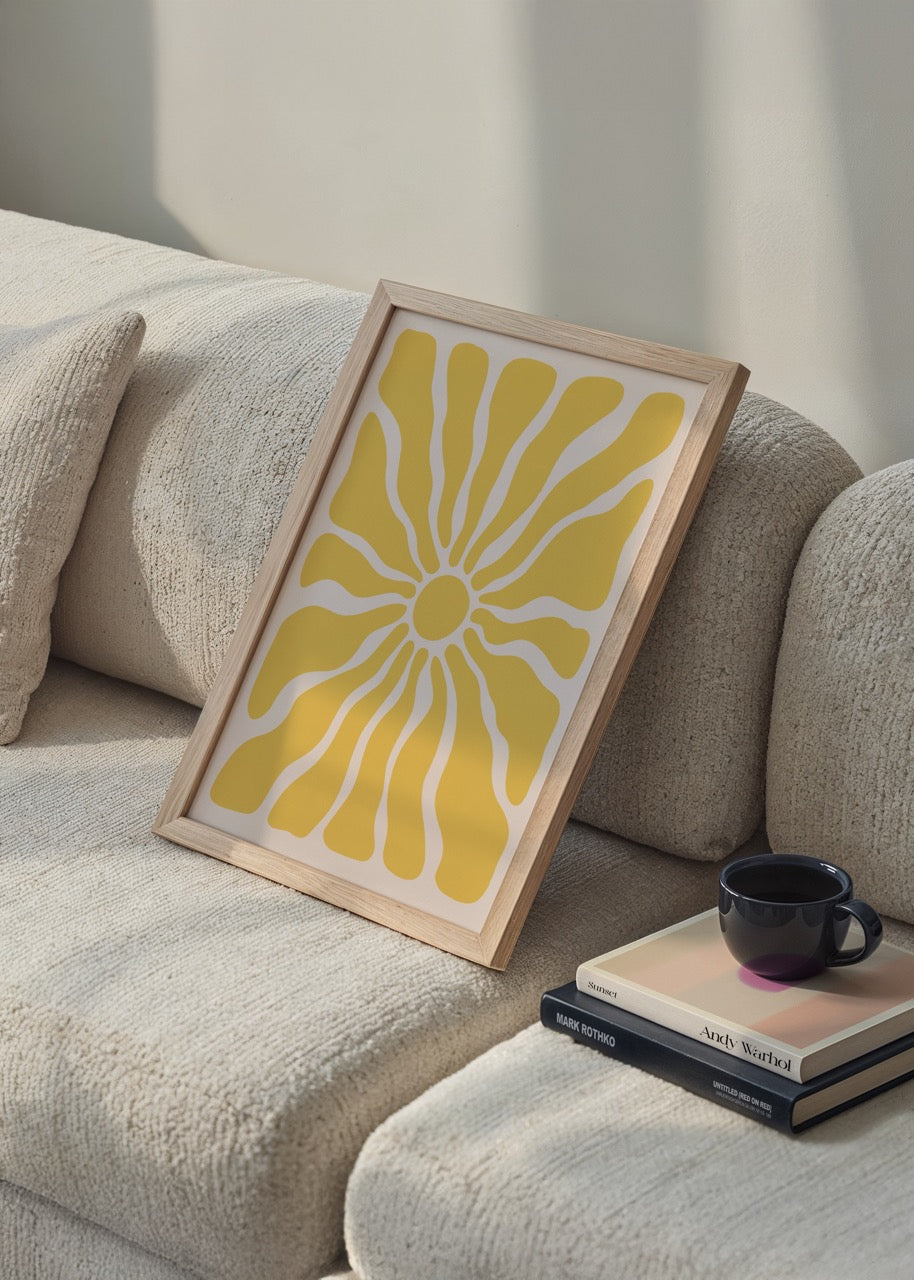 Abstract print featuring a vibrant yellow sunburst design.