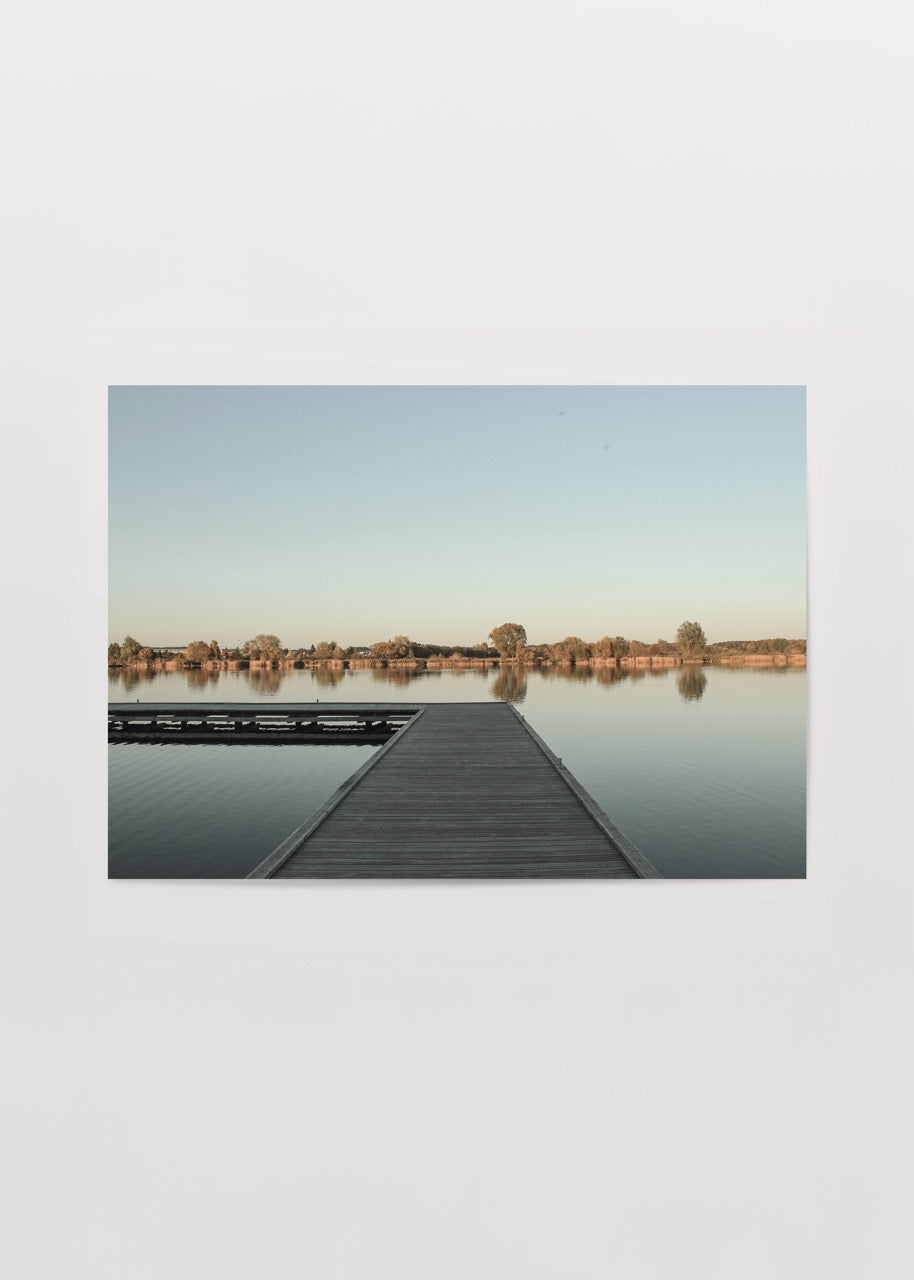 Tranquil photographic poster of Silent Pier Lake in Białystok, reflecting calm waters.