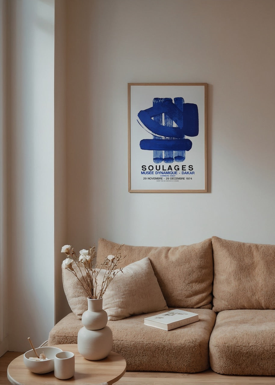 Dynamic blue abstraction wall art on a neutral wall