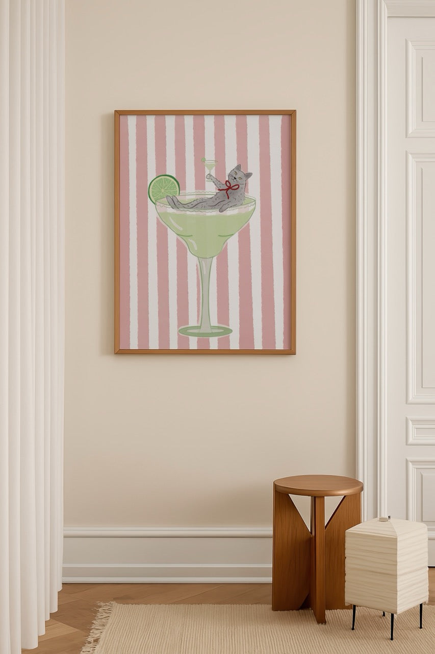 Whimsical cat lounging in a cocktail, ideal for playful wall art.