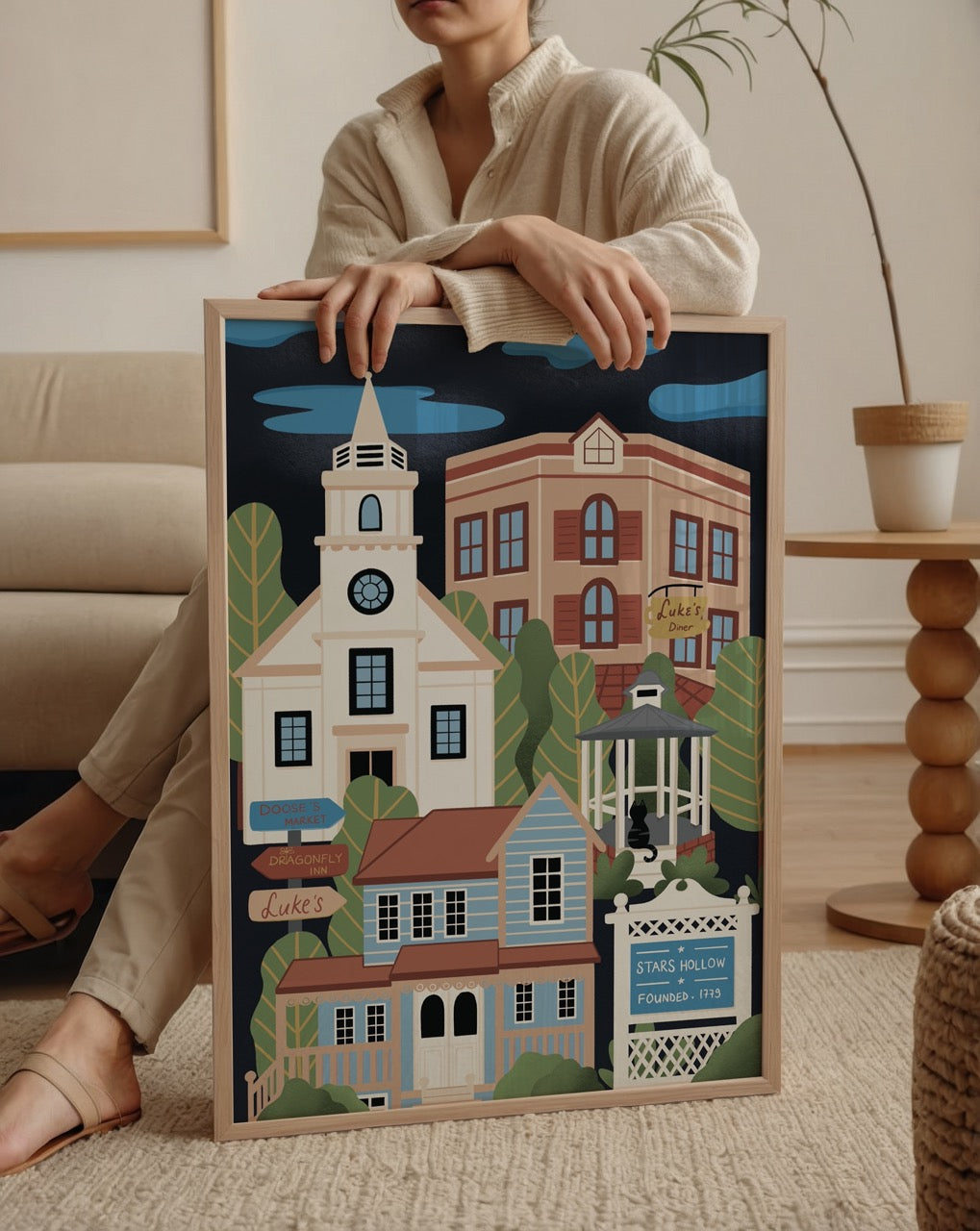 Vibrant illustration of Stars Hollow showcasing iconic buildings and greenery.