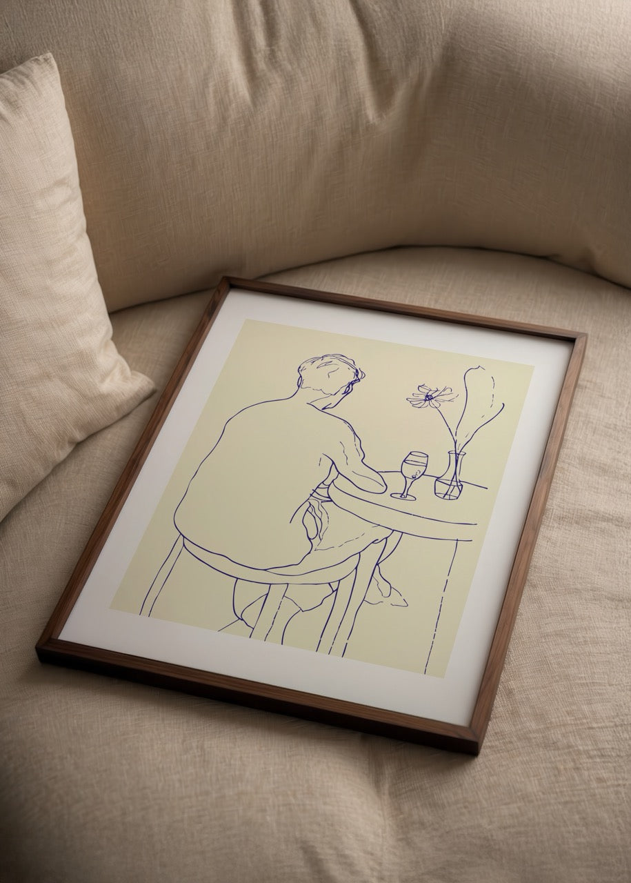 Minimalist line drawing of a person sitting at a table with a drink and a flower.