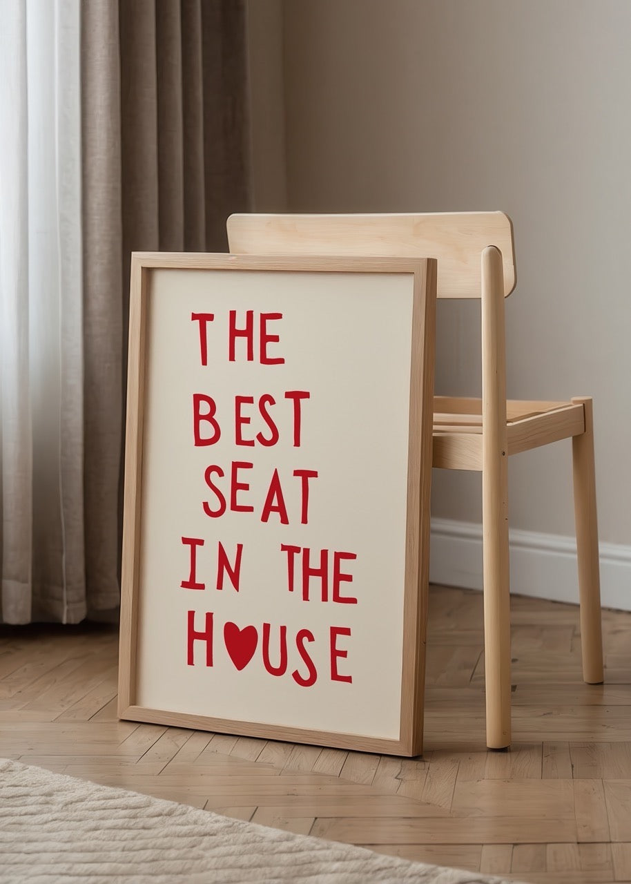 Typography wall art featuring bold red letters on a beige background.