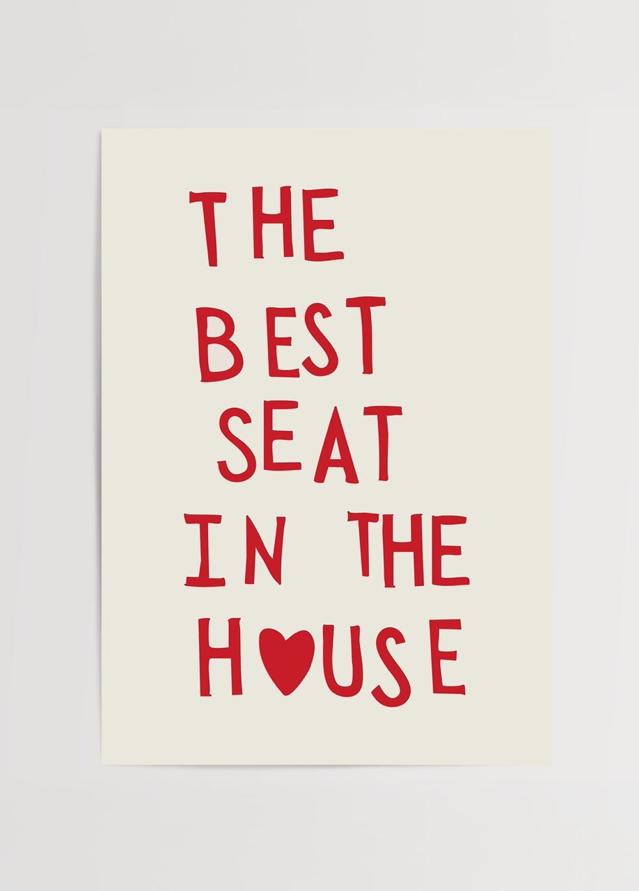 Typography wall art featuring bold red letters on a beige background.
