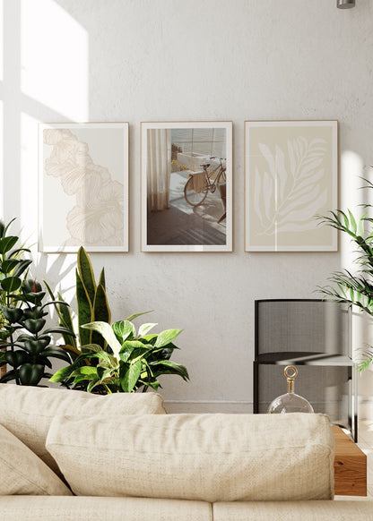 Serene Beige Triptych Poster Set featuring elegant line art and tranquil imagery.