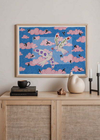 A vibrant illustrated poster print featuring birds and clouds in soft pink and blue tones.