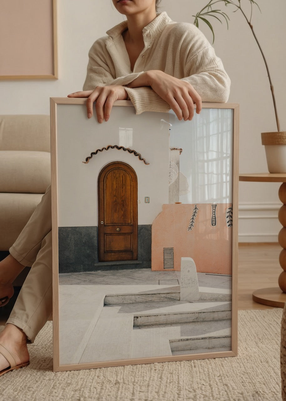 Mediterranean architecture featuring a wooden door and textured wall.
