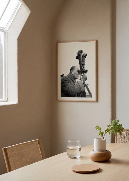 A thoughtful figure gazing through a telescope, capturing a moment of vision.