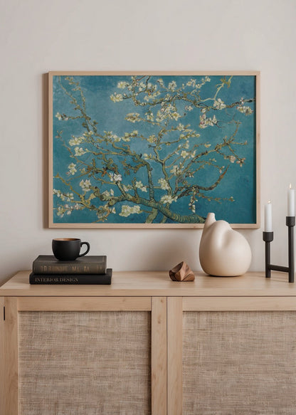 Artwork of blossoming branches on a tranquil blue background.