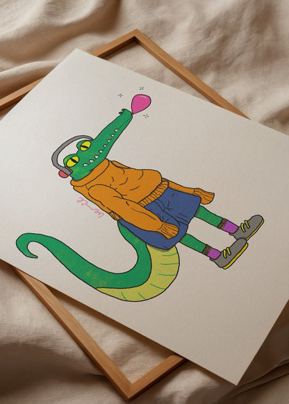 A playful cartoon crocodile character in an orange sweater and blue shorts.