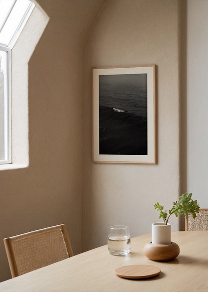 Black and white photography of ocean waves, evoking calmness and elegance.