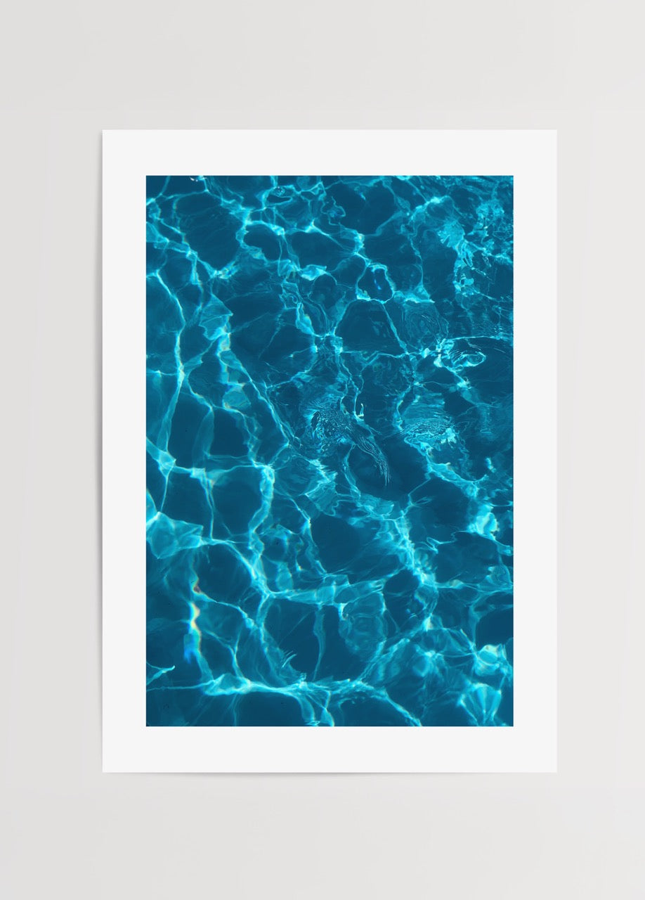 A tranquil blue water reflection poster for serene interior decor.