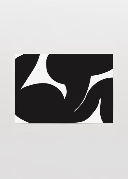Dynamic black and white abstract wall art featuring bold silhouettes.