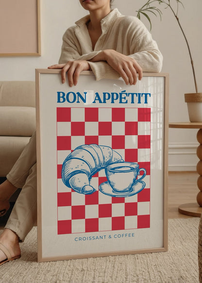 Illustrative poster of a croissant and coffee on a checkered background.