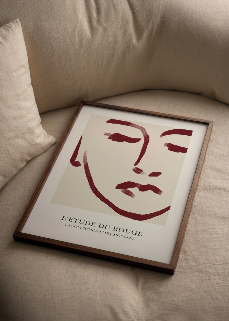 Abstract red and beige art print featuring a minimalist face.