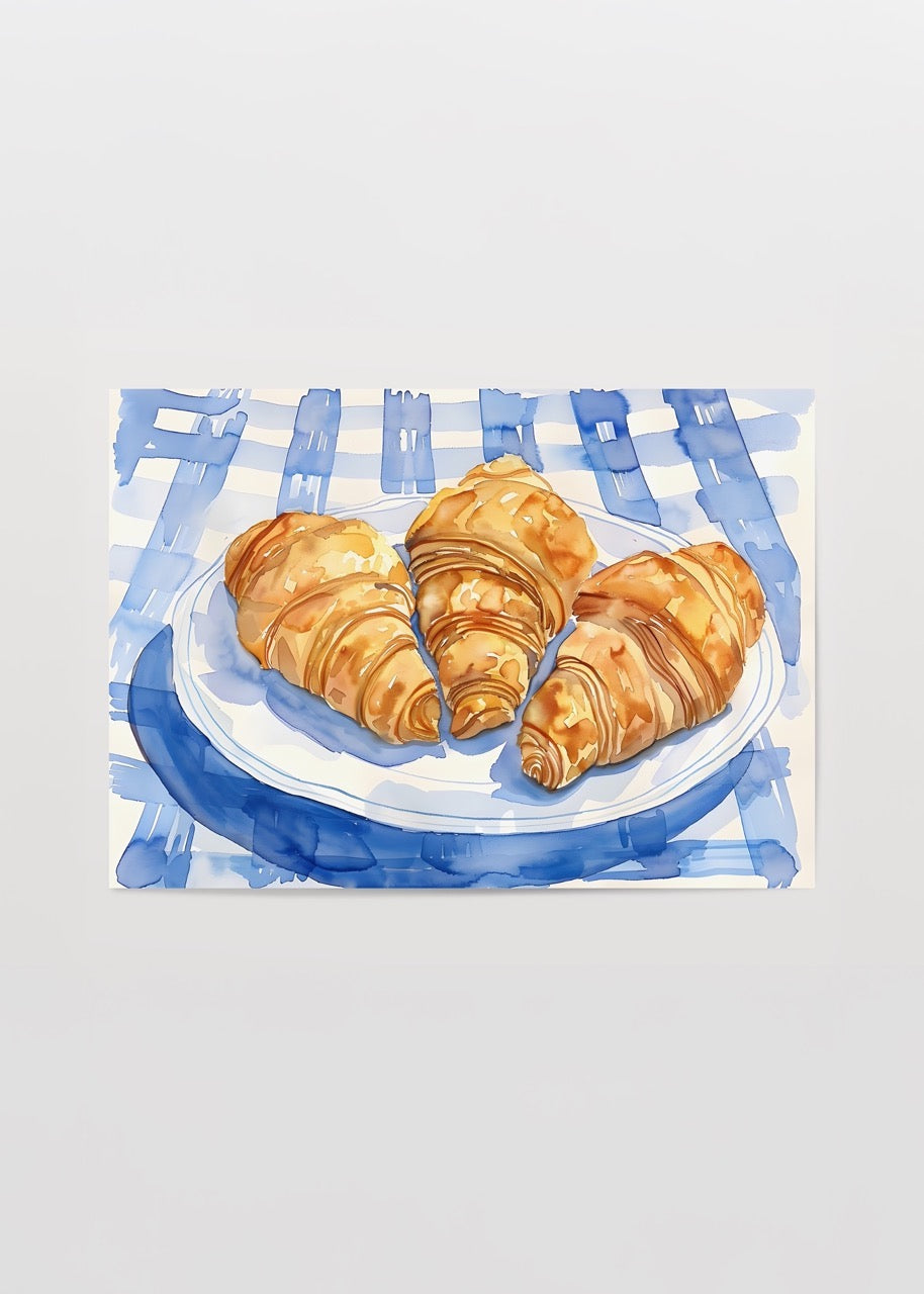 Illustration of croissants on a blue tablecloth, perfect for kitchen decor.
