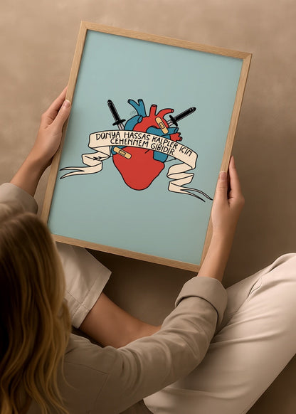 A heart illustration with pens and a banner, symbolising sensitivity and emotion.