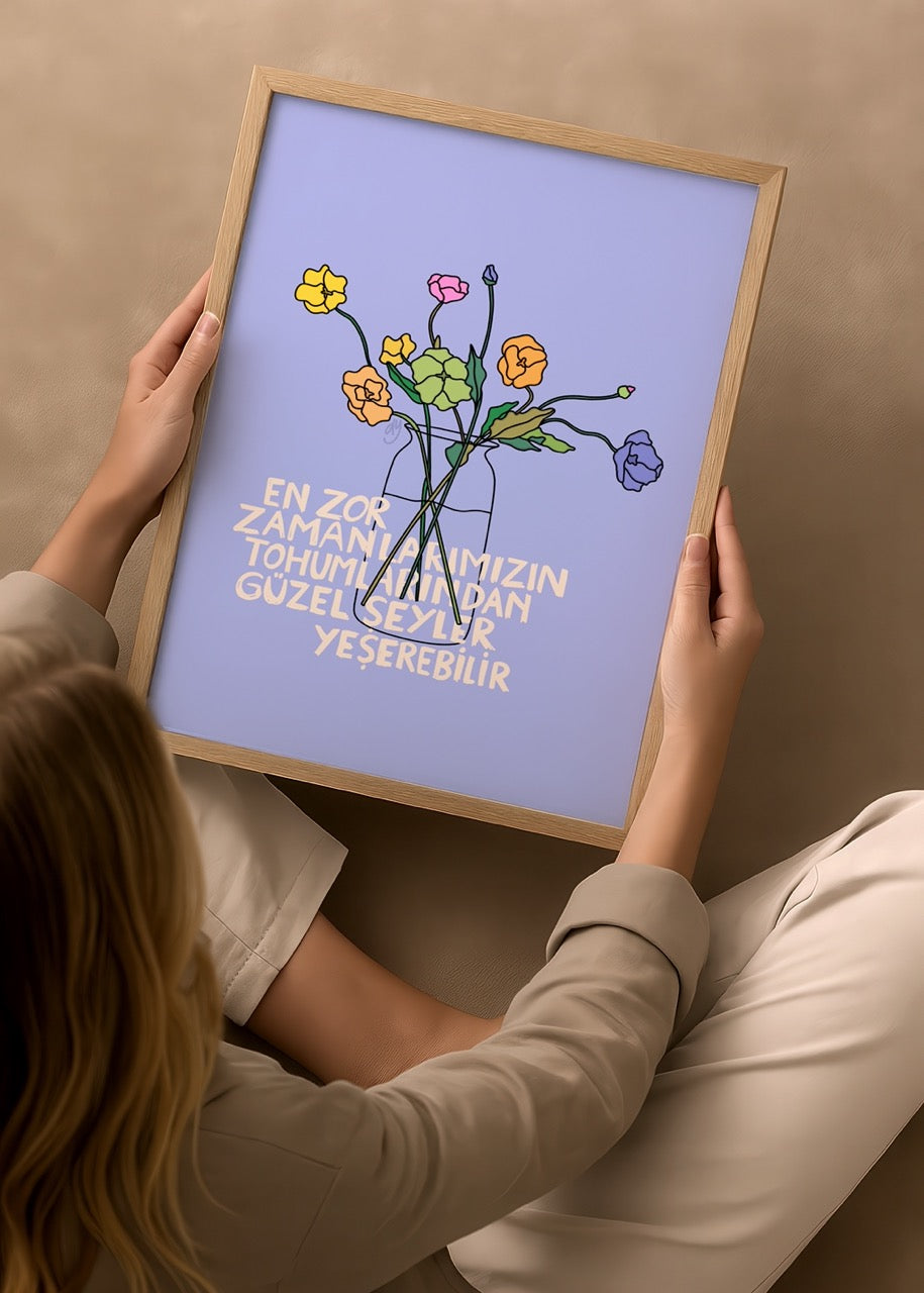 Poster print featuring colorful blooms on a pastel background with inspirational text.