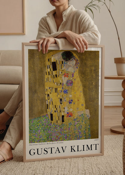 A stunning gold and vibrant artwork depicting an intimate embrace, perfect for enhancing any wall.