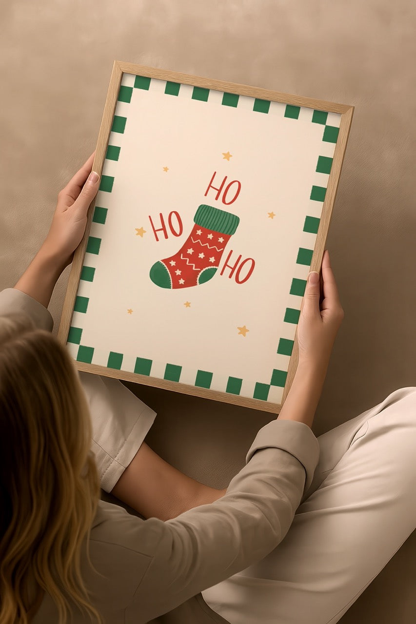 A festive poster print featuring a colourful Christmas stocking with &