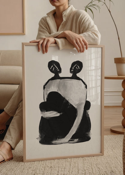 Abstract black and white poster featuring a dual silhouette design.