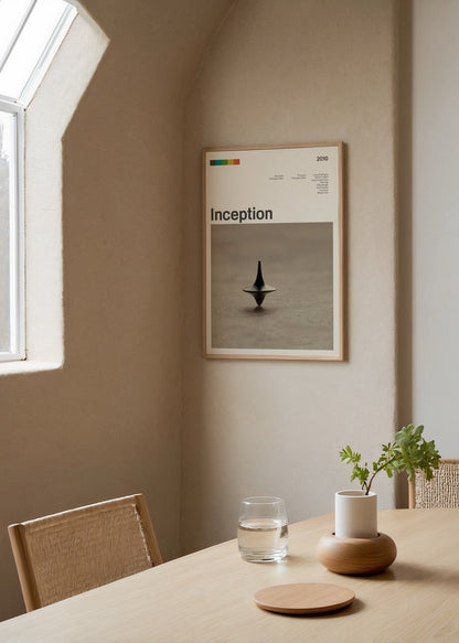 Minimalist wall art featuring a spinning top, symbolising dreams and reality.