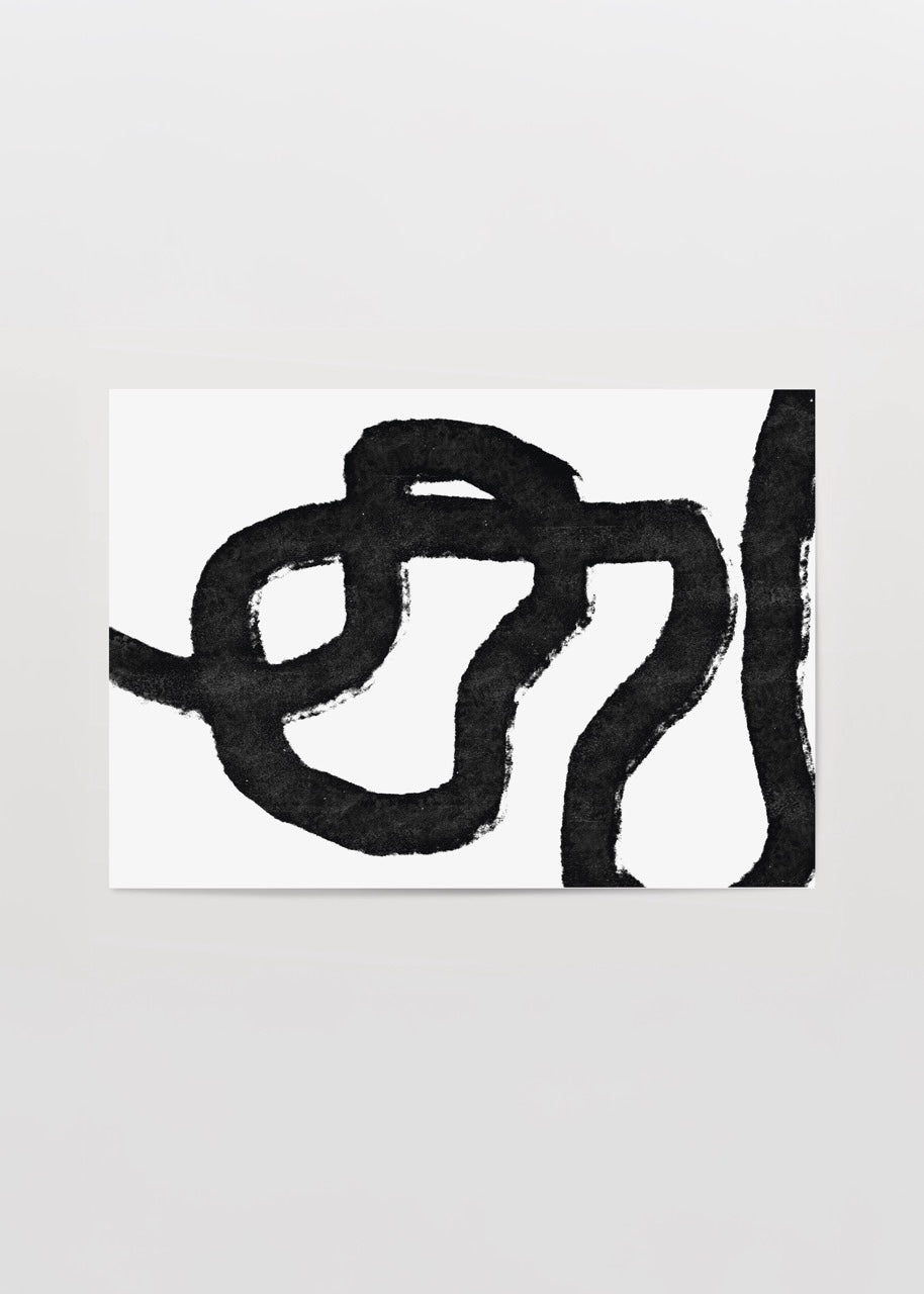 Abstract art print featuring fluid black lines on a white background.