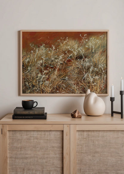 A captivating artwork featuring delicate wild grass against earthy tones, perfect for enhancing any interior space.